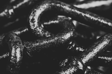 thick big old chain on a dark background