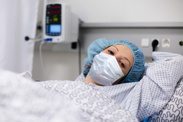 Patient in hospital. Virus outbreak. Face mask.