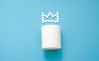 Toilet paper with a crown of pills