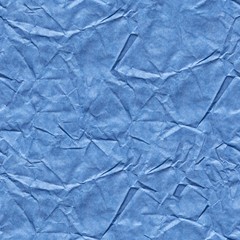 Crumpled paper background in saturated blue color for your awesome greeting card. Seamless texture.