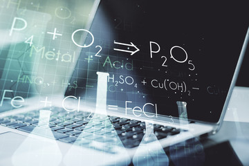 Creative chemistry concept on modern laptop background. Multiexposure