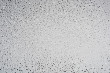 White water drops on glass. Background.