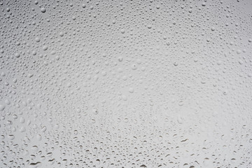 White water drops on glass. Background.