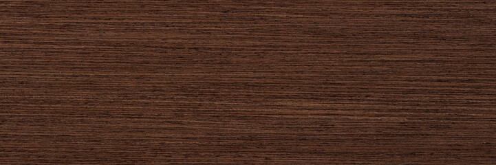 Brown veneer background as part of your new interior. Natural wood texture, pattern of a long veneer sheet, plank.