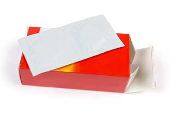 Box and paper pack with medical pills on white background