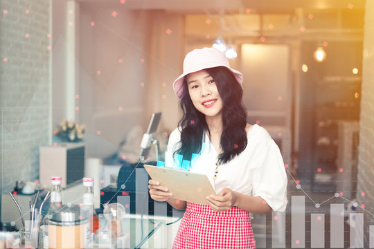 Business woman hand holding 3d graph​ are checking market graph​ at coffee shop, Finance and Investment concept.