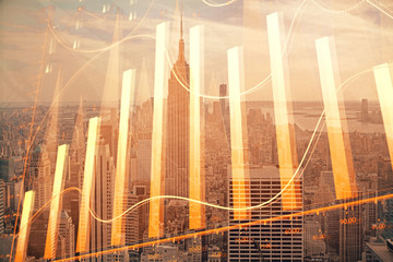 Forex graph on city view with skyscrapers background double exposure. Financial analysis concept.