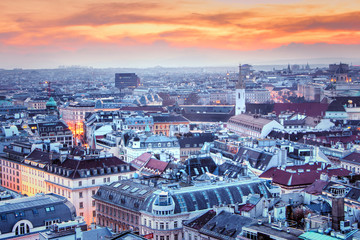 Austria, Vienna-  View from the main cathedral of St. Stephen to the city, twilight. Evening view of the city of Vienna, the lights of the night city.