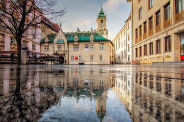 Bratislava, Slovakia - walk in the old city of Bratislava, view of the city.View on the Old town hall in reflection