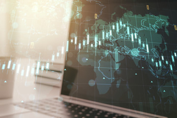 Double exposure of abstract creative financial diagram with world map on computer background, banking and accounting concept