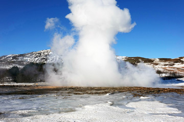 Iceland. Geyser Strokkur and the geothermal fields