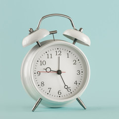 Old alarm clock light background place for your test