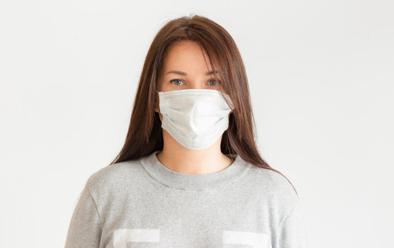 Woman In Face Mask On White Background. Coronavirus Flu Virus Concept