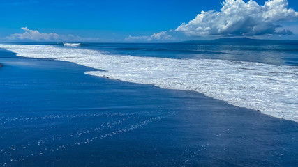 A desolate ocean shore with rolling waves. Background banner panorama