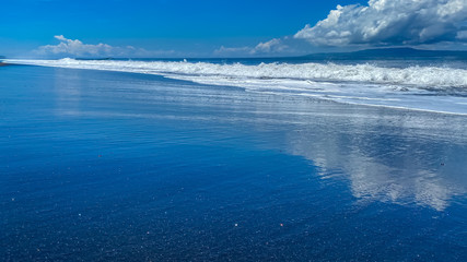 A desolate ocean shore with rolling waves. Background banner panorama