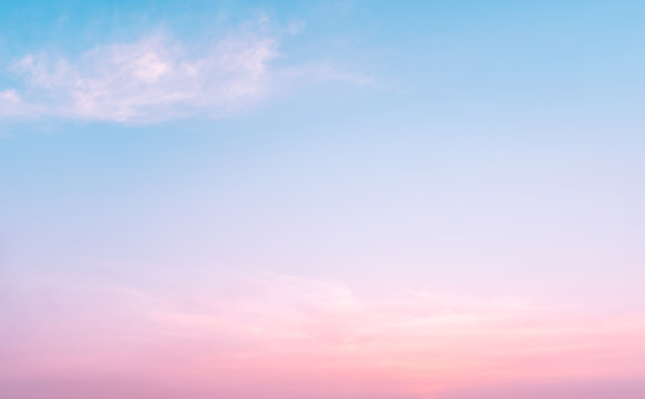Beautiful sweet sunrise dramatic blue sky violet clouds with golden light background
