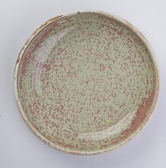 colorful ceramic plate on white background