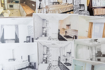 Drawings of a house or apartment are on the table. Designer desk with graphic outline of apartment. Architects project