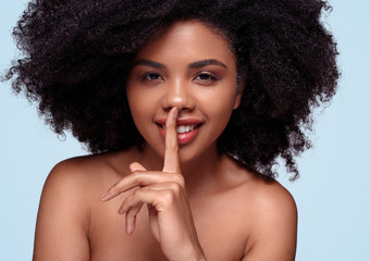 Black female keeping secrets of beauty