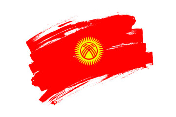 Flag of the Kyrgyz Republic. Kyrgyzstan red banner brush concept with green star. Horizontal Illustration isolated on white background.  