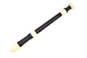 Black flute recorder on a white isolated background, top view