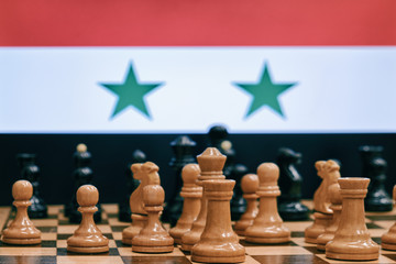 Flag of Iran on the background of a chessboard with pieces