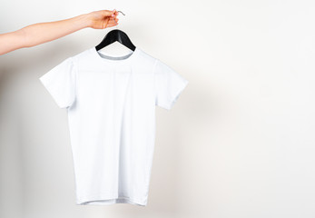 Close up of a white color t-shirt, copy space