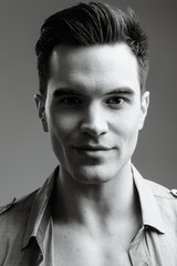 Young handsome businessman in black and white