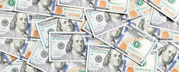 Top view of American money background. Pile of dollar cash. Paper banknotes concept
