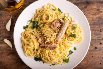  Seafood spaghetti with garlic and parsley. Healthy and nutritious Italian food. Blue fish, omega 3 recipe.