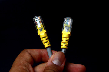 UTP LAN cable with yellow cord and RJ45