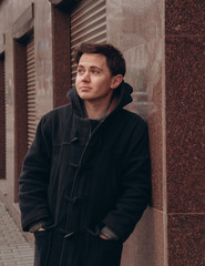 portrait of a young guy on the street