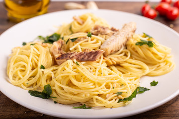  Seafood spaghetti with garlic and parsley. Healthy and nutritious Italian food. Blue fish, omega 3 recipe.