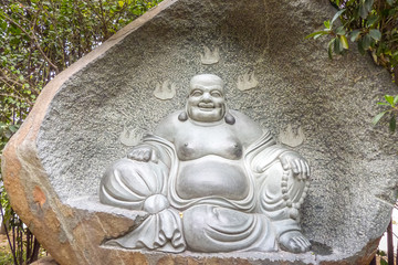 Buddha statue carved in stone, Giant Wild Goose Pagoda, X'ian, China