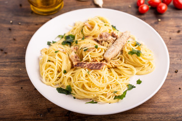  Seafood spaghetti with garlic and parsley. Healthy and nutritious Italian food. Blue fish, omega 3 recipe.