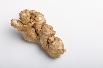 Fresh ginger on white background, herb medical concept