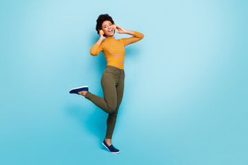 Fototapeta na wymiar Full length body size view of her she nice attractive girlish cheerful wavy-haired girl listening hit dancing having fun isolated on vivid shine vibrant blue green teal turquoise color background