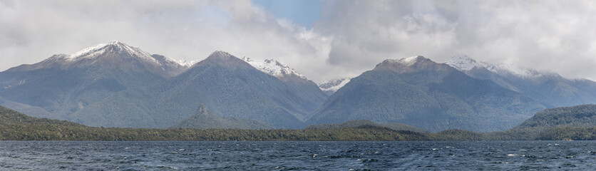 Fototapeta na wymiar lake and snow on Hunter range, near Manapouri, New Zealand