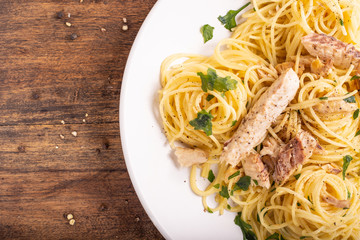  Seafood spaghetti with garlic and parsley. Healthy and nutritious Italian food. Blue fish, omega 3 recipe.