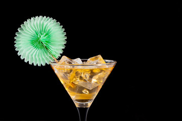 cocktail glass with green ornament close-up