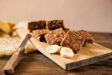 Homemade sliced banana bread with almonds and oats.