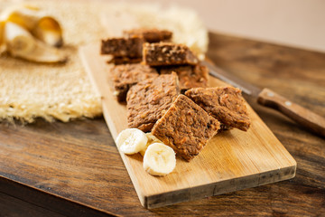 Homemade sliced banana bread with almonds and oats.