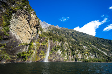 Fototapeta na wymiar Beautiful panorama of Fairy Falls in Milford Sound taken on a sunny spring day, New Zealand