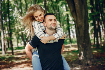 Couple in a forest, warm summer, lovely weather