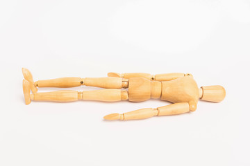 Wooden doll on white background with copy space