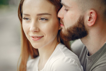 Couple in a forest. Man in a green t-shirt