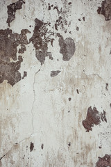 Cracked and peeling paint old wall background.