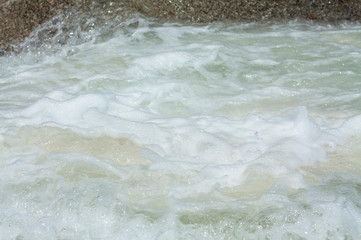 water wave foam in closeup detail background