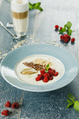 oatmeal breakfast with raspberries