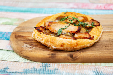 Delicious Mexican quesallidas made with chicken, tomato pieces and served with guacamole sauce.